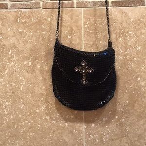 Y2k Black purse, mesh jewl kind of top layer, cross jewl thing on front.